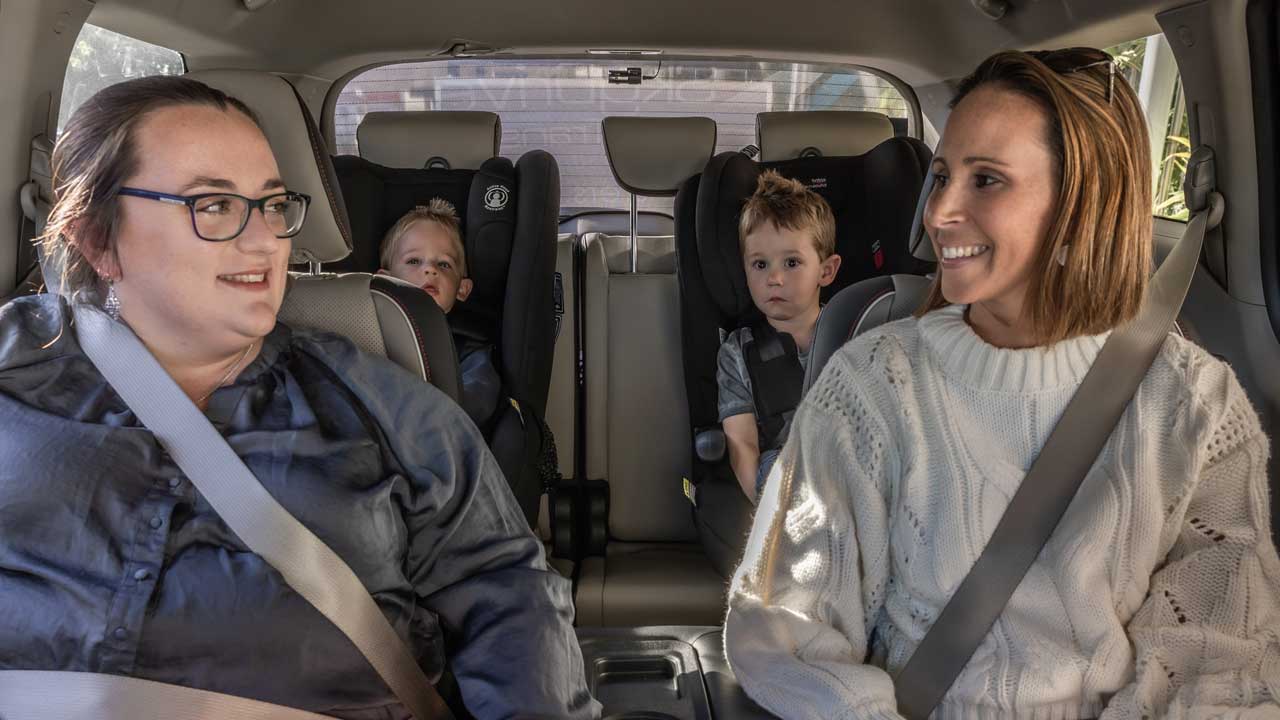private transfers sunshine coast - family in car
