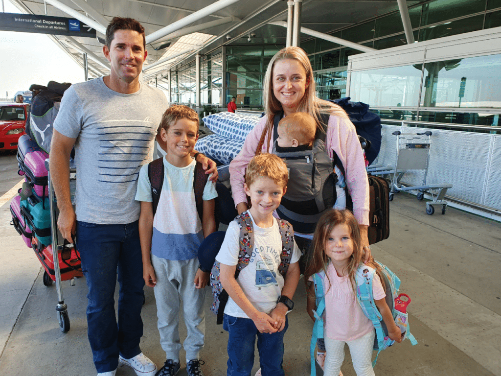 Airport Transfers Mooloolaba- family infront of SkyDrive vehicle