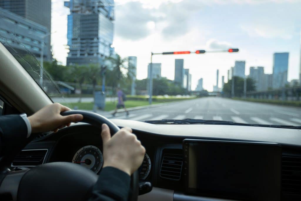 Sunshine Coast Transfers - Driving car in modern city
