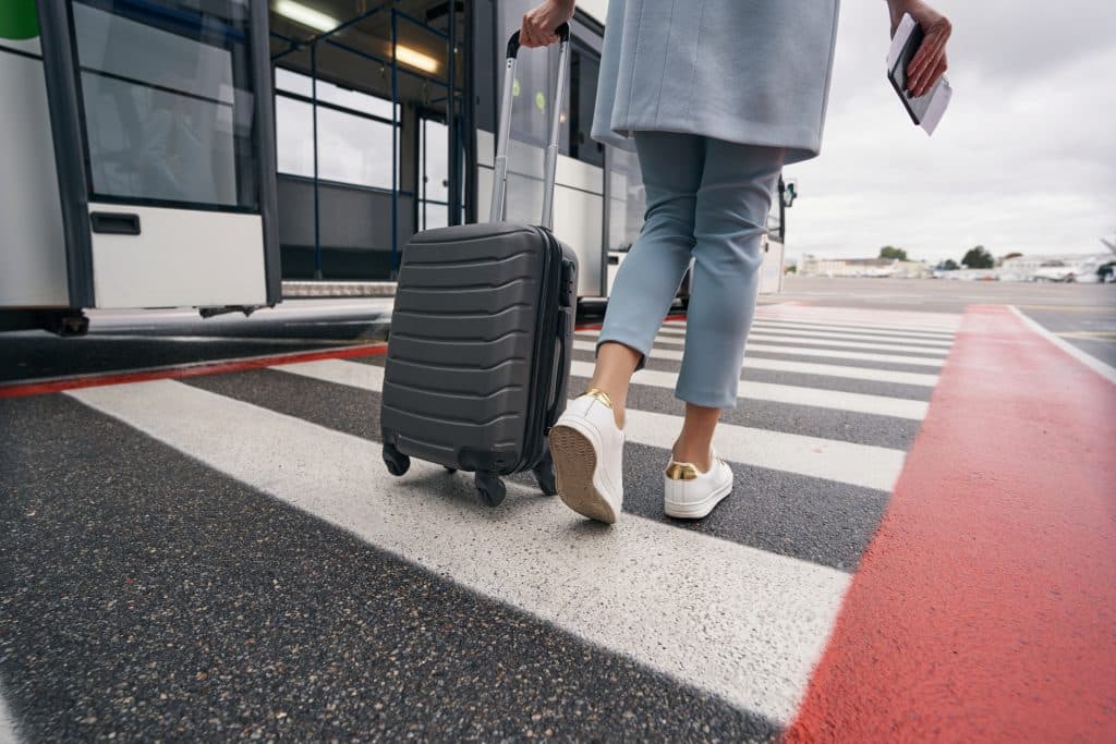 Mooloolaba airport transfers - woman walking with luggage